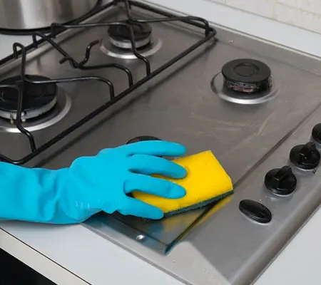 Pasos para limpiar Estufa de Acero Inoxidable 6 Lavado de una estufa de acero inoxidable con pasta de bicarbonato